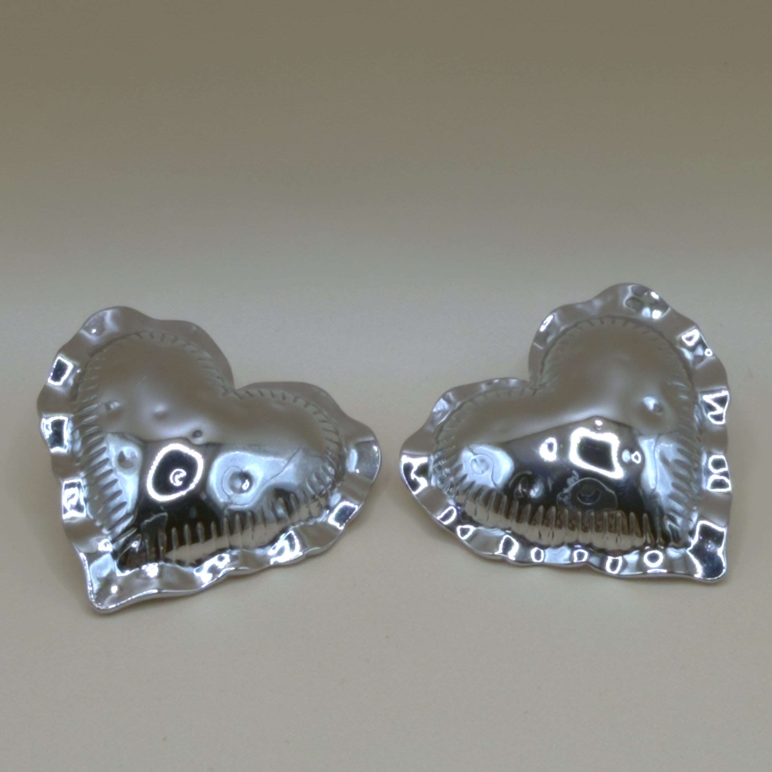 Boucles acier inoxydable couleur argent