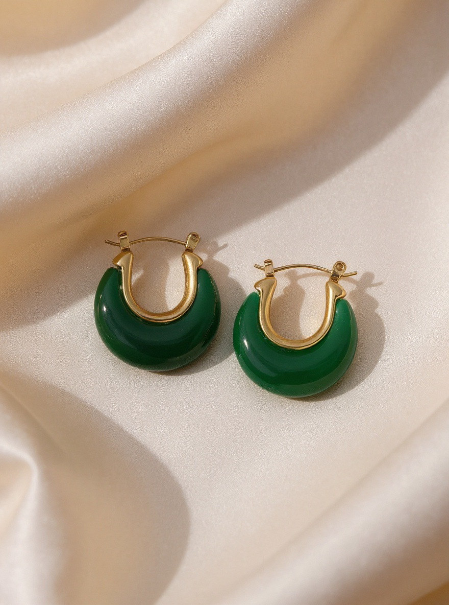 Boucles vertes élégantes en résine